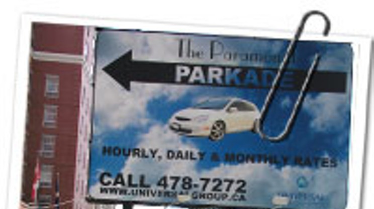 Paramount Apartments on South Park has a billboard in the middle of the sidewalk advertising its spacious parking lot.