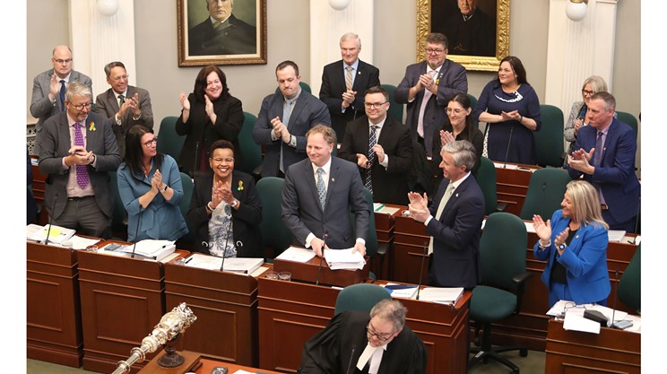 Finance minister Allan MacMaster reading the provincial budget for 2024-25 into the House of Assembly on Feb. 29. The budget includes a universal lunch program for children in public schools that will be rolled out over the next four years.