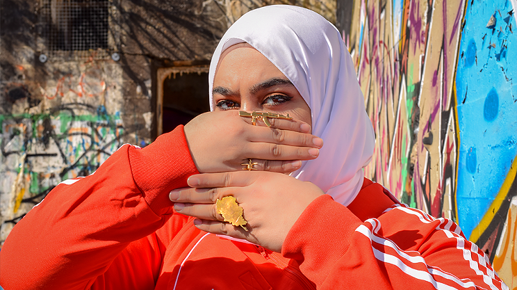Meet the Halifax rapper breaking barriers and spitting bars—all while wearing a hijab