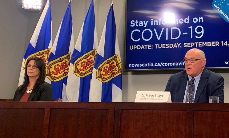 Health minister Michelle Thompson, left, at her first COVID briefing with top doc Strang, says the fourth wave is officially in Nova Scotia.