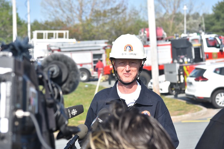 Halifax Fire deputy chief David Meldrum speaks with reporters the morning after a blaze tore through Upper Tantallon and Hammonds Plains on May 28, 2023.