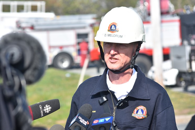 Halifax deputy fire chief Dave Meldrum addresses reporters from a fire response command post at the St. Margaret's Centre.